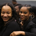 two black students posing for photos